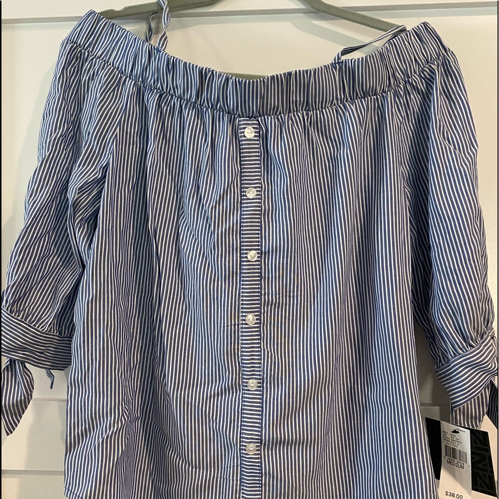 Off the shoulder top, with shoulder straps.